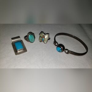 Mexican silver jewelry lot. 2 rings 1 bracelet 1 pendant